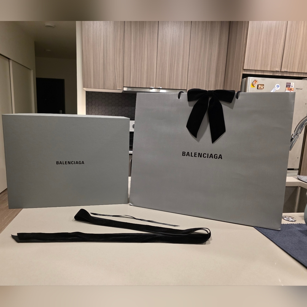 Empty box with ribbon bow and Paper bag